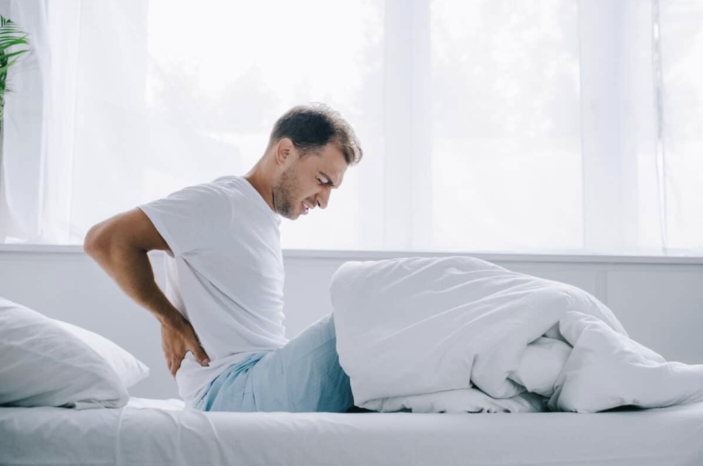 How can my lower back hurt when I inhale?